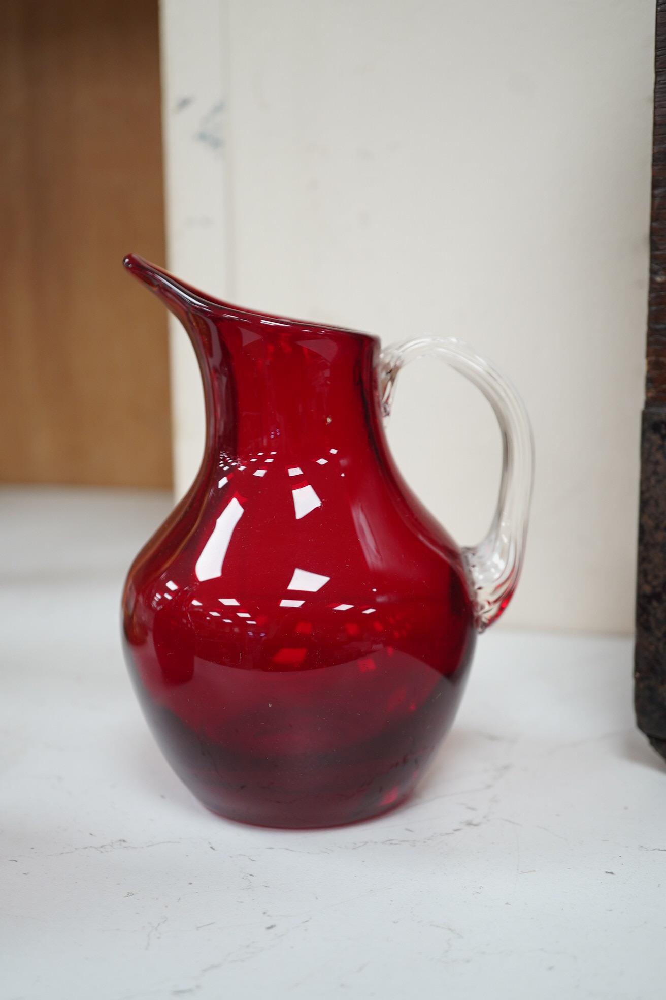 Seven red glass vases including Whitefriars, tallest 21cm high. Condition -good